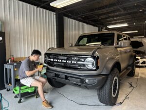 Full vehicle transformation using matte satin stealth paint protection film (PPF) in Ottawa.