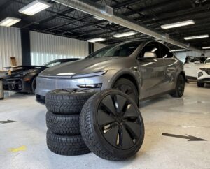 A set of premium electric vehicle tires designed specifically for Tesla models at an Ottawa service shop.